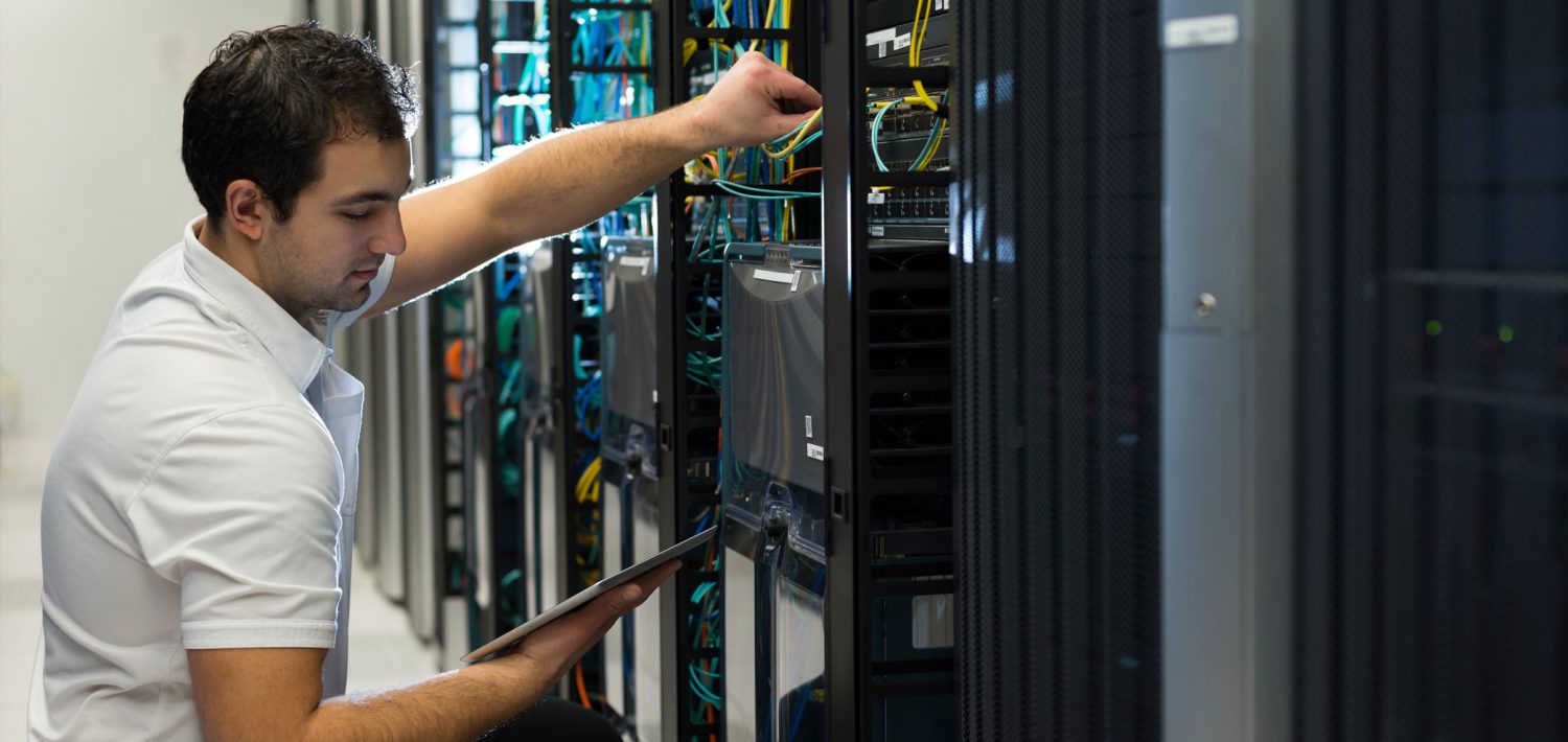 Network administrator working on servers.